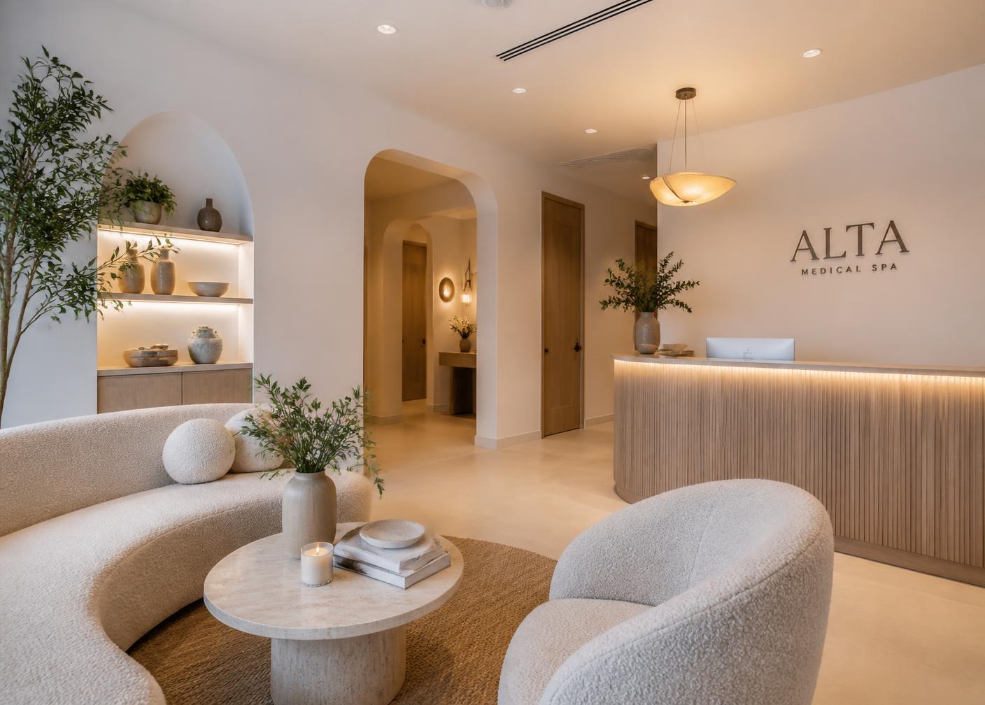 Medical office interior design Las Vegas med spa reception with plaster walls and curved seating